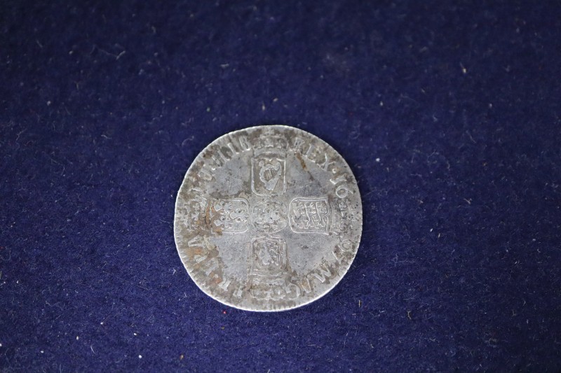 A William III silver shilling, 1697, third head, F